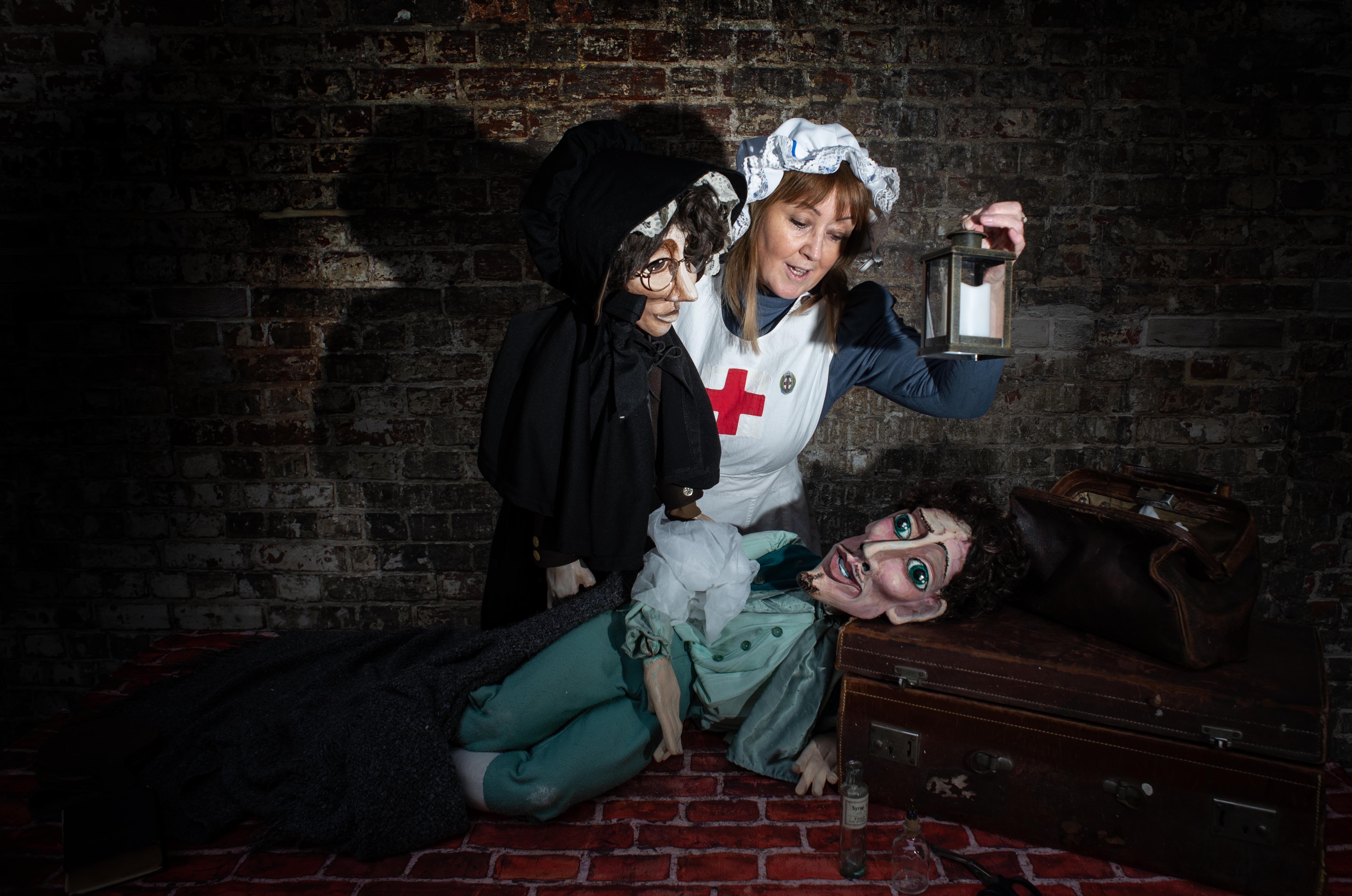 Rachel Goodall as Florence with Rachella and puppets in The Tale of the Nightingale